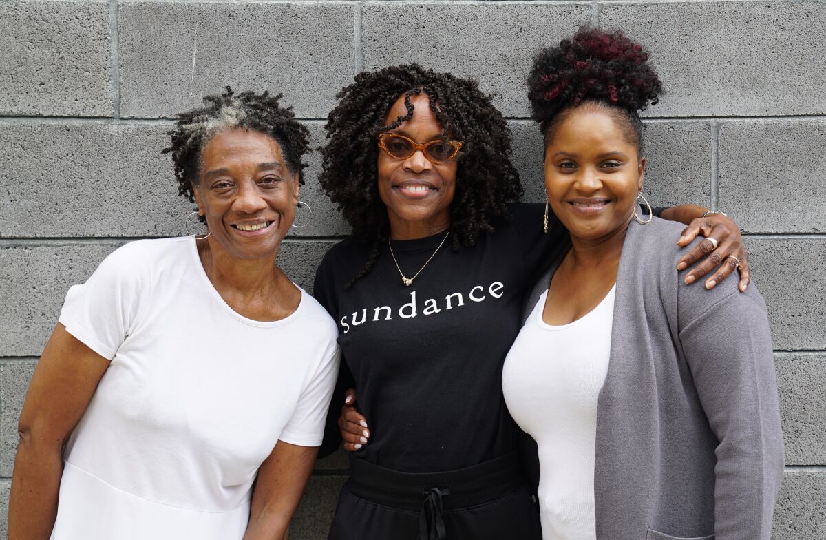 Playwright Charlayne Woodard, center, with "The Garden" cast, Stephanie Berry, left, and Monique Gaffney, right.