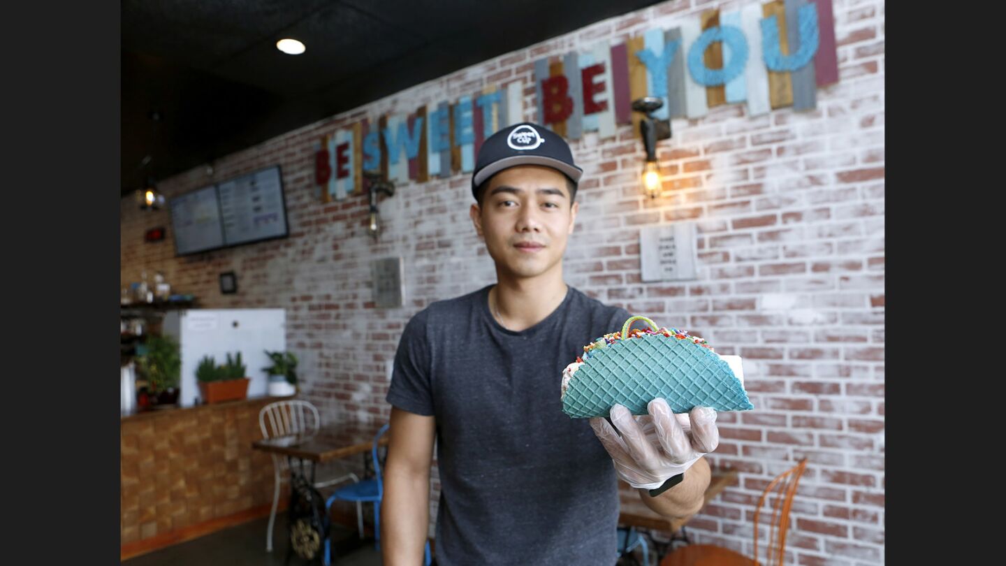 Kenny Tran has found success marketing his ice cream tacos via Instagram. This taco was made from vanilla ice cream, fruity pebbles, sprinkles and a strip of sweet candy.