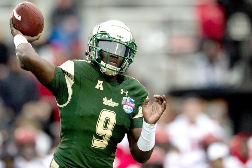 South Florida quarterback Quinton Flowers (9) throws a pass against Texas Tech during the first half the Birmingham Bowl NCAA college football game, Saturday, Dec. 23, 2017 in Birmingham, Ala. (AP Photo/Albert Cesare)