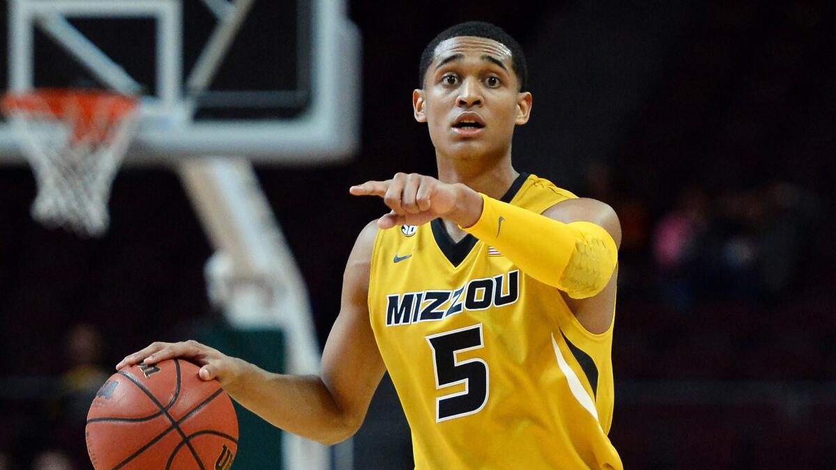 Missouri's Jordan Clarkson directs teammates during a game against Northwestern in November 2013. Clarkson is set to receive the rookie minimum from the Lakers this season.