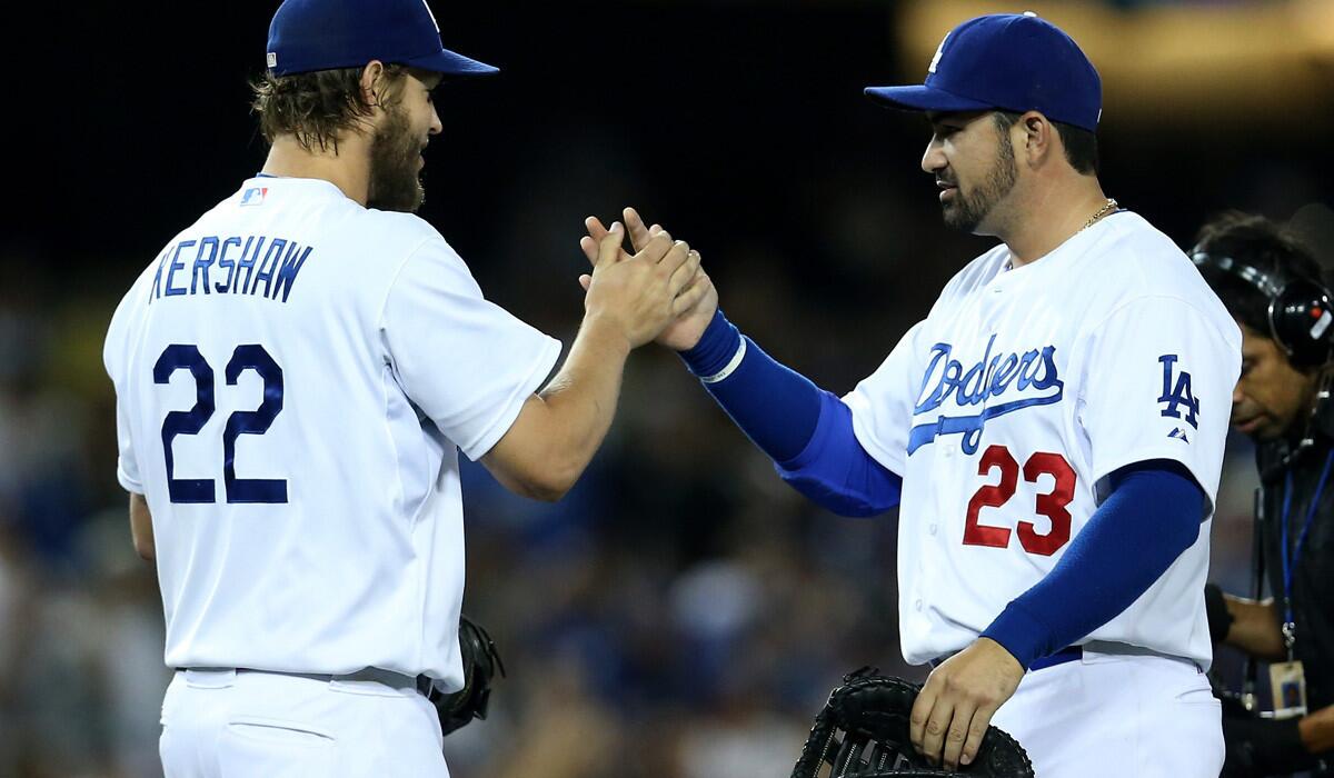 With the Dodgers' top three pitchers, including ace Clayton Kershaw, scheduled to face the Giants this weekend in San Francisco, first baseman Adrian Gonzalez (23) admits it's a three-game series that L.A. 'must' win.