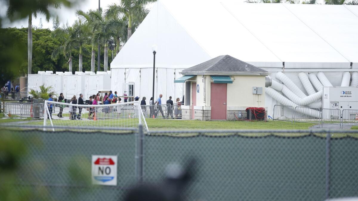 This temporary shelter in Florida is one of several where people who crossed the U.S. border are being held.