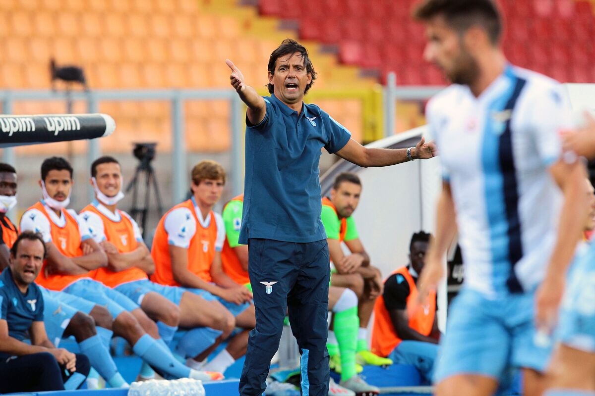 Lazio coach Simone Inzaghi gives instructions to his players during the Serie A soccer match between Lecce and Lazio at the Stadio del Mare in Lecce, Italy, Tuesday, July 7, 2020. (Donato Fasano/LaPresse via AP)