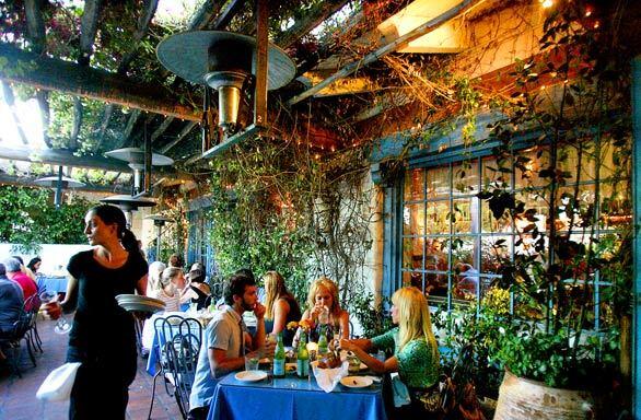 Its a wild party inside Taverna Tony in Malibu, but out on the bougainvillea-covered veranda, diners can sit back and relax.