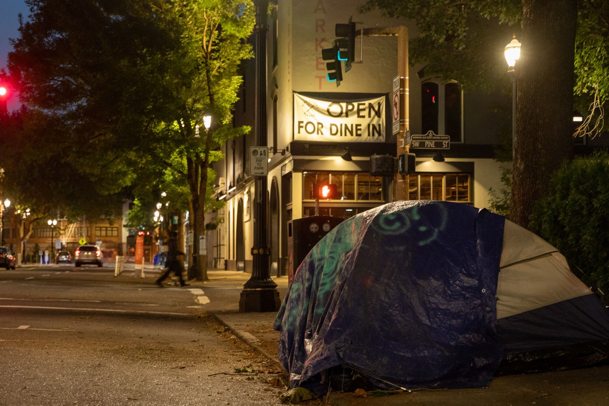 A tent on a sidewalk in Portland.