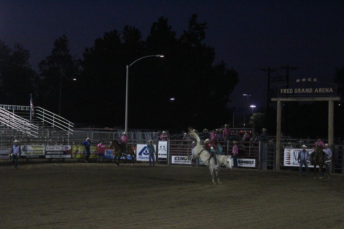 Wyatt Denny riding bareback for the full eight seconds to start off the rodeo Thursday night.