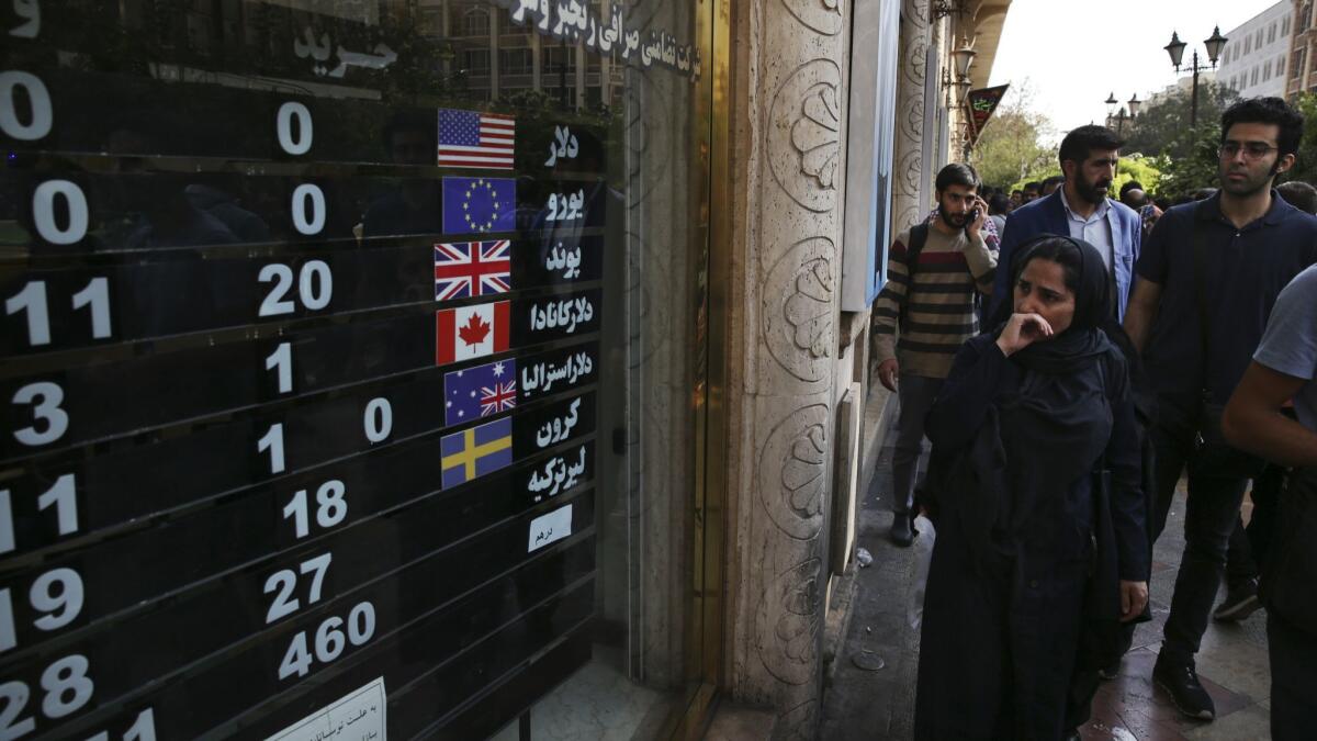 A Tehran exchange shop displays currency rates in October 2018.