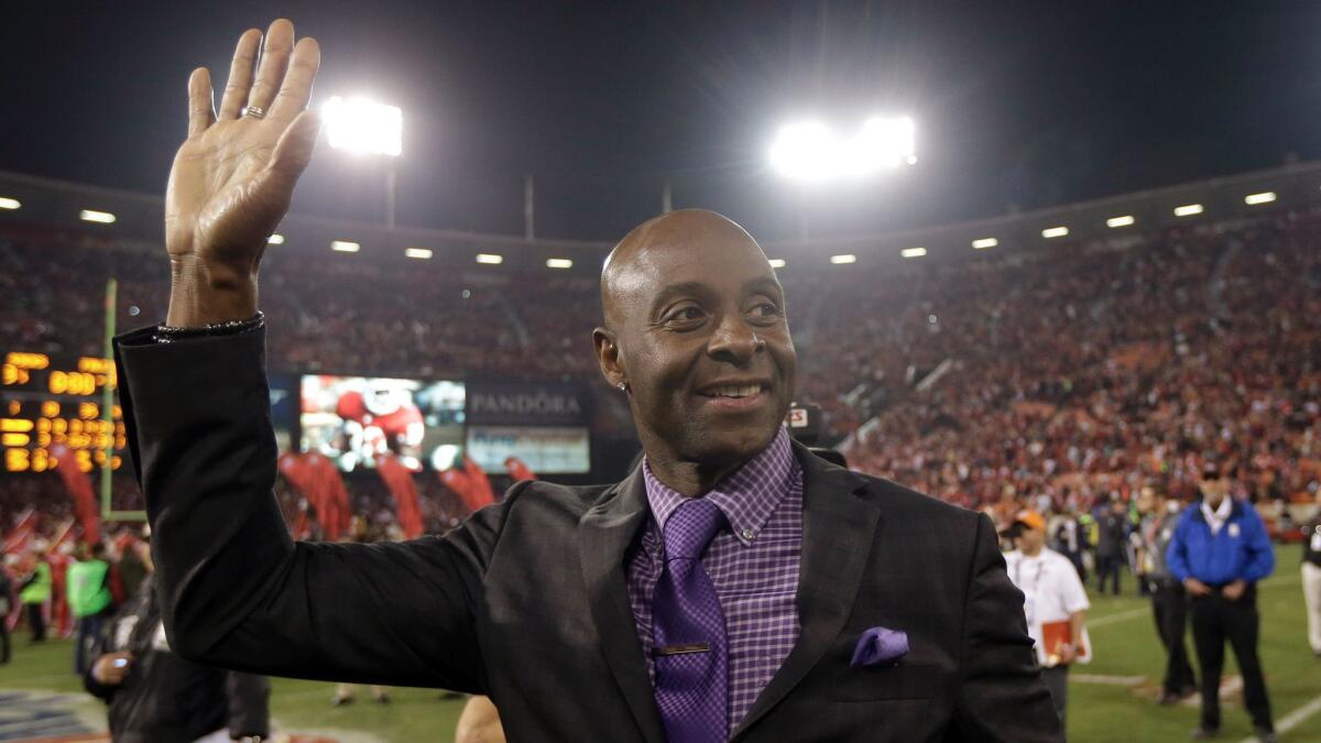 Jerry Rice waves to the crowd after the last NFL game at Candlestick Park after between the San Francisco 49ers and Atlanta Falcons on Dec. 23, 2013.