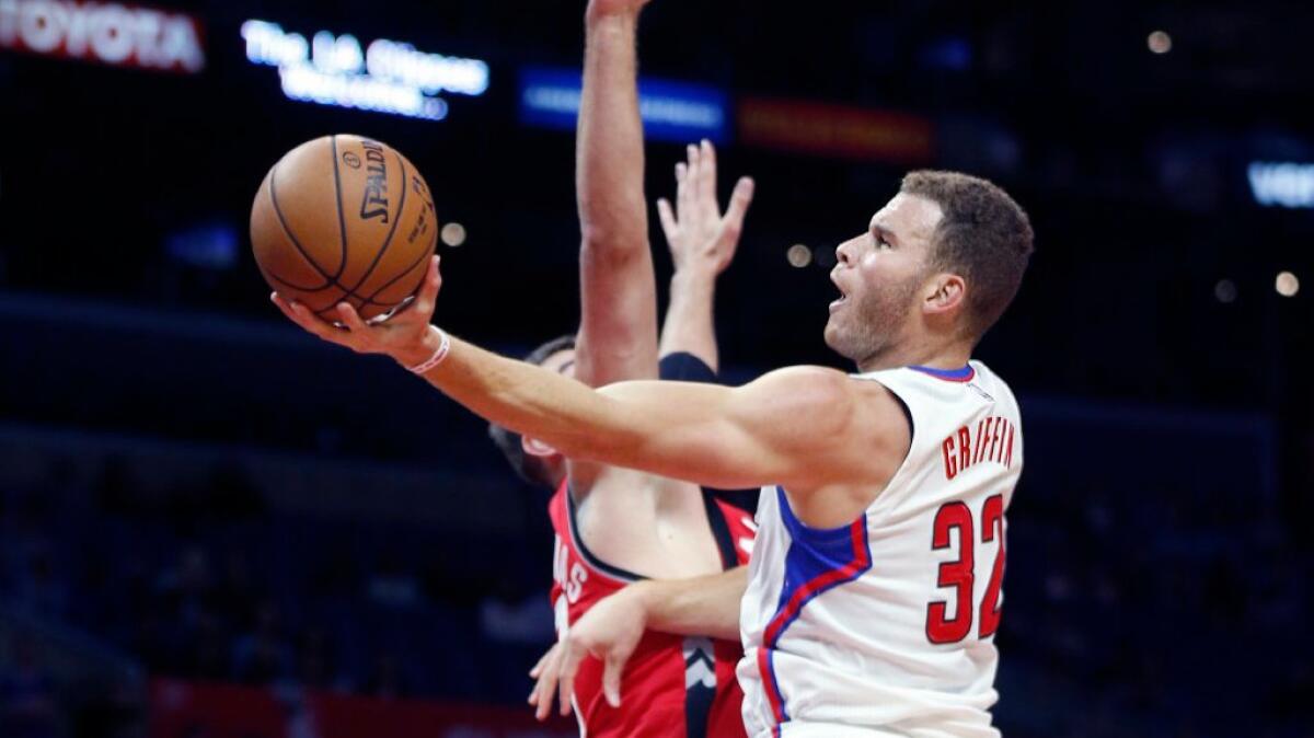 Clippers forward Blake Griffin, seen in a preseason game, says he's healthy and ready for the new season. The Clippers open at Portland Thursday night.