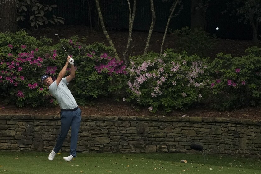 Justin Rose, of England, tees off on the 12th hole during the first round of the Masters golf tournament on Thursday, April 8, 2021, in Augusta, Ga. (AP Photo/Charlie Riedel)