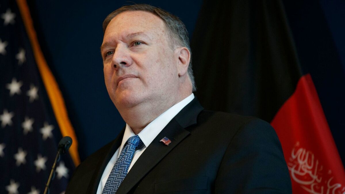 Secretary of State Michael R. Pompeo listens to a question during a news conference at the U.S. Embassy in Kabul, Afghanistan, on June 25, 2019.