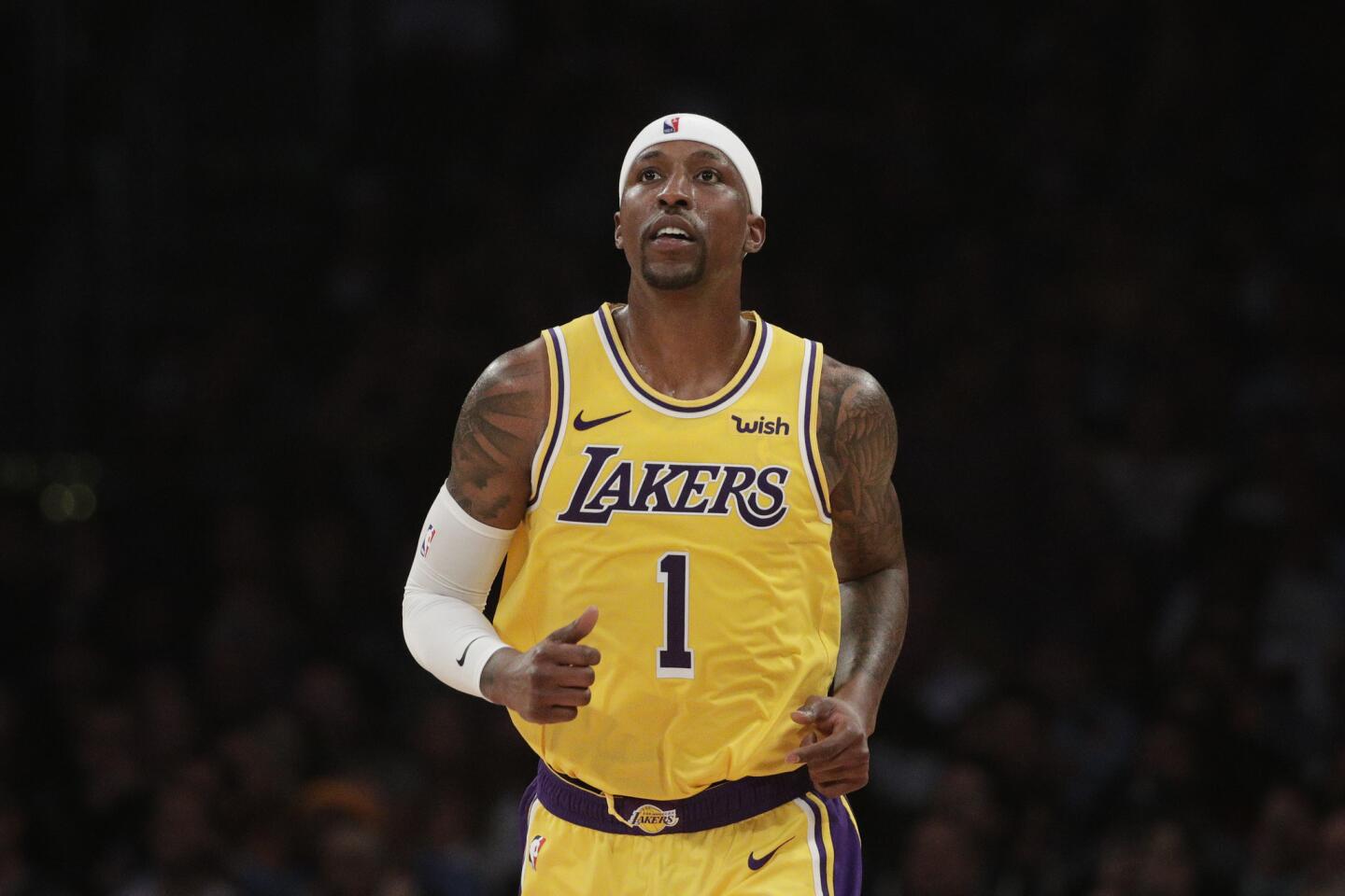 Los Angeles Lakers' Kentavious Caldwell-Pope runs down the court during the second half of an NBA basketball game against the Washington Wizards, Tuesday, March 26, 2019, in Los Angeles. The Lakers won 124-106. (AP Photo/Jae C. Hong)