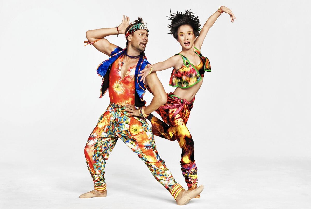 Matthew Dibble and Rika Okamoto in Yowzie costumes, part of Twyla Tharp's 50th-anniversary tour.