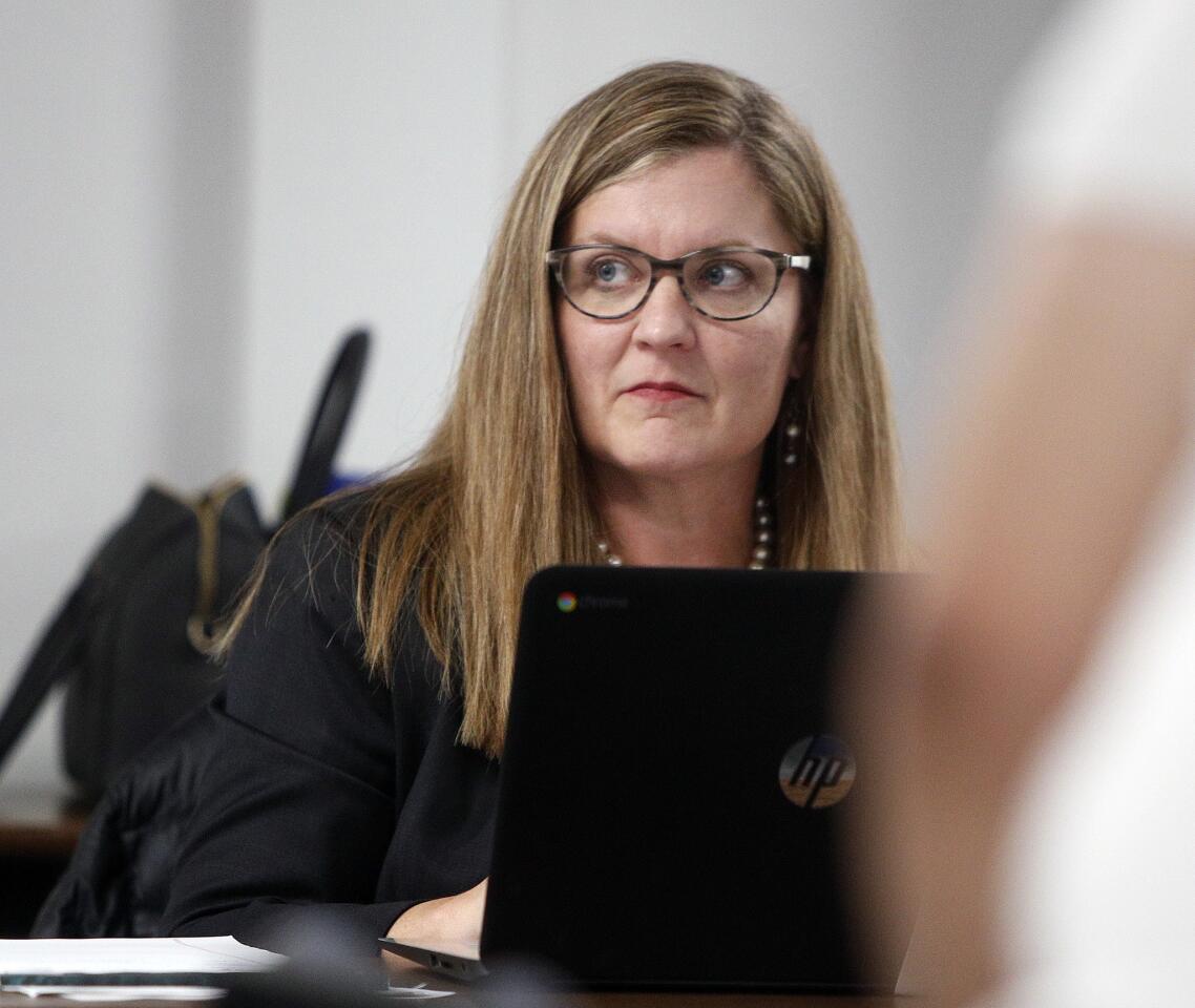 Burbank Unified School District administrative secretary Laura Erisman takes notes at a Burbank Unified School District Facilities Naming Committee meeting to discuss changing the name of David Star Jordan Middle School at Burbank Unified School District headquarters on Thursday, December 13, 2018. The school's namesake, Jordan was a well-known zoologist, educator and first chancellor of Stanford University who was also a known propagator of eugenics, a theory of controlled breeding and separating of races, which was later espoused by the Nazis.