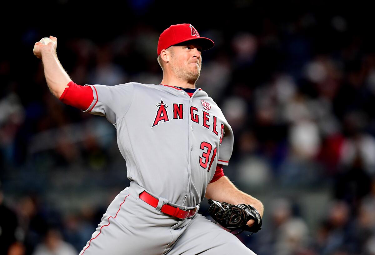 Angels pitcher Ty Buttrey delivers a pitch.