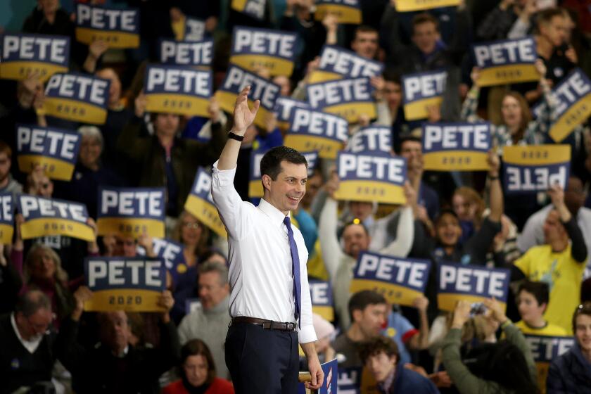 NASHUA, NEW HAMPSHIRE - FEBRUARY 09: Democratic presidential candidate former South Bend, Indiana Mayor Pete Buttigieg finishes his remarks at a Get Out the Vote rally at Elm Street Middle School February 09, 2020 in Nashua, New Hampshire. New Hampshire holds its first in the nation primary in two days. (Photo by Win McNamee/Getty Images)