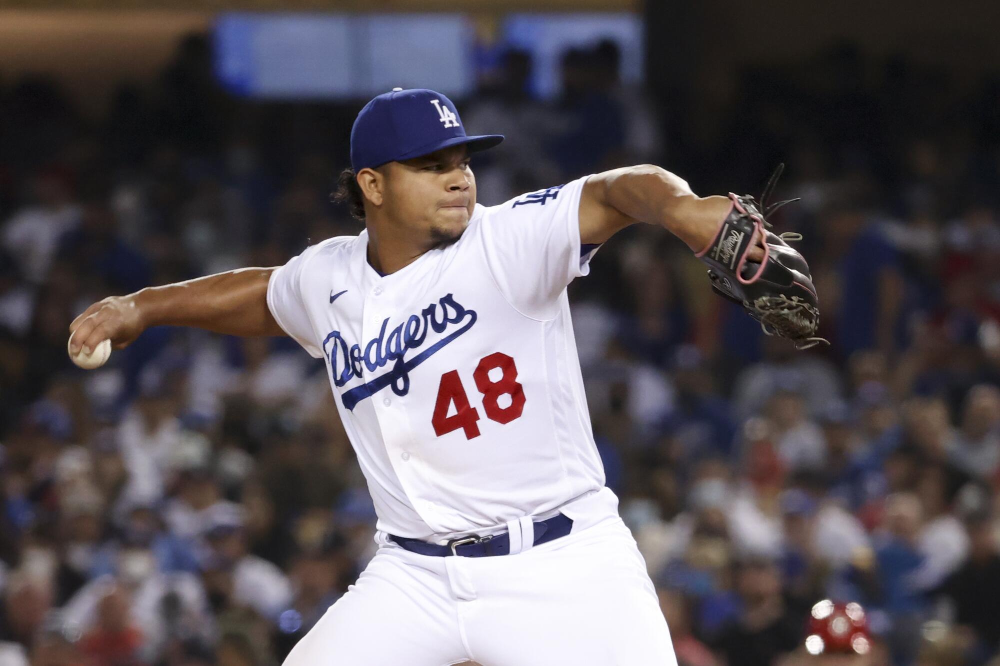 Los Angeles Dodgers relief pitcher Brusdar Graterol delivers a pitch