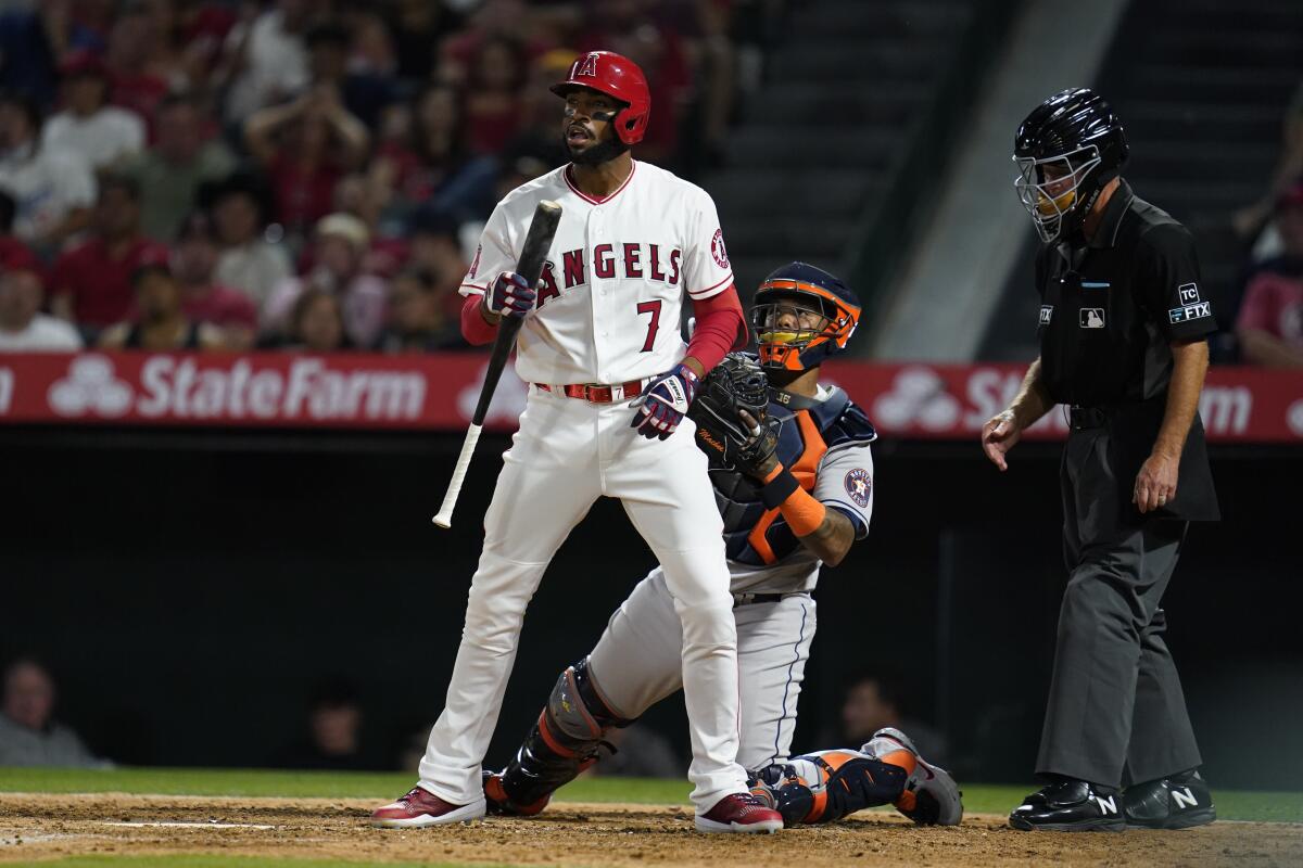 Angels' Jo Adell reacts after striking out.