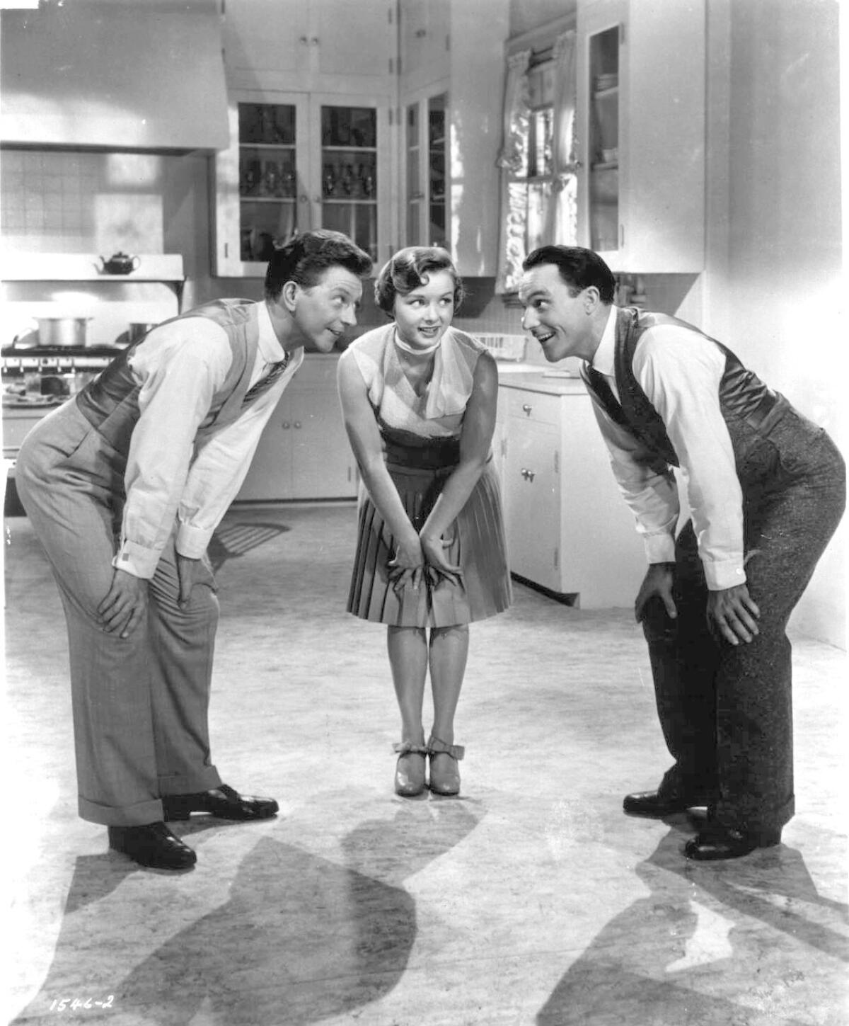 Donald O'Conner, left, Debbie Reynolds and Gene Kelly in "Singin' in the Rain." (Marvin Paige / American Cinematheque)