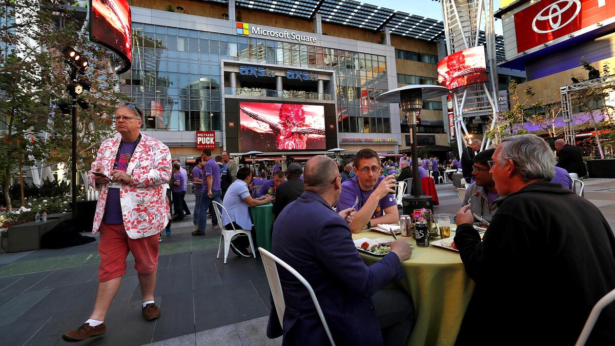 Diners enjoy in the courtyard at L.A. Live in downtown Los Angeles during a private event on June 6.