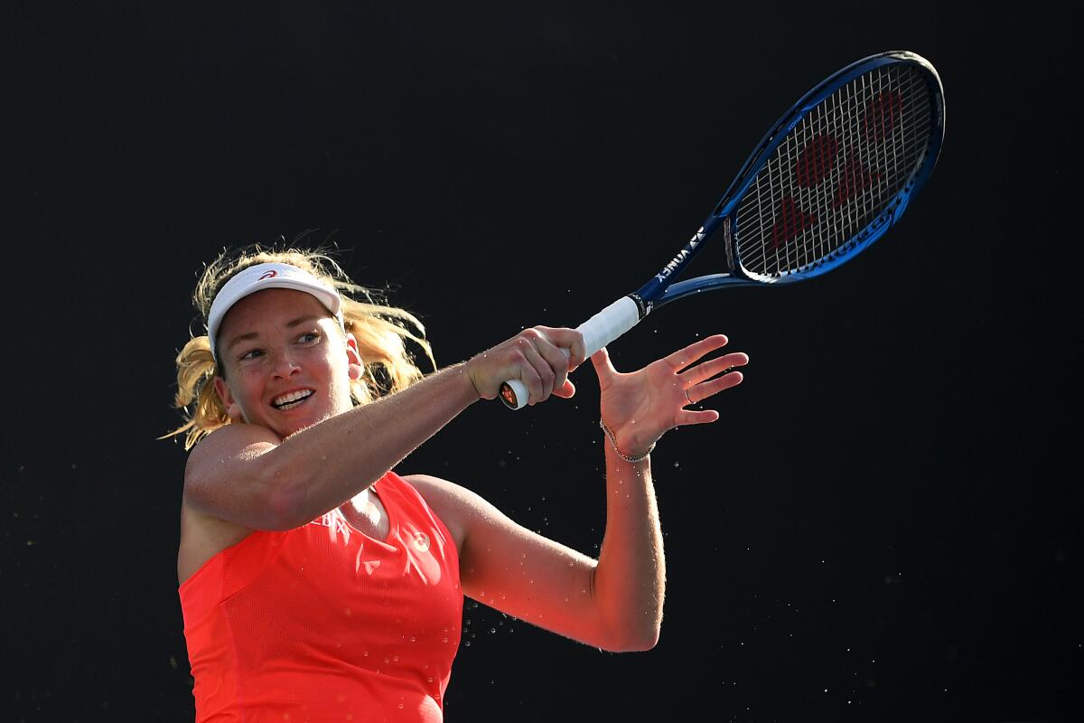 CoCo Vandeweghe plays a forehand during her first-round match against Laura Siegemund at the 2020 Australian Open on Jan. 21 in Melbourne.