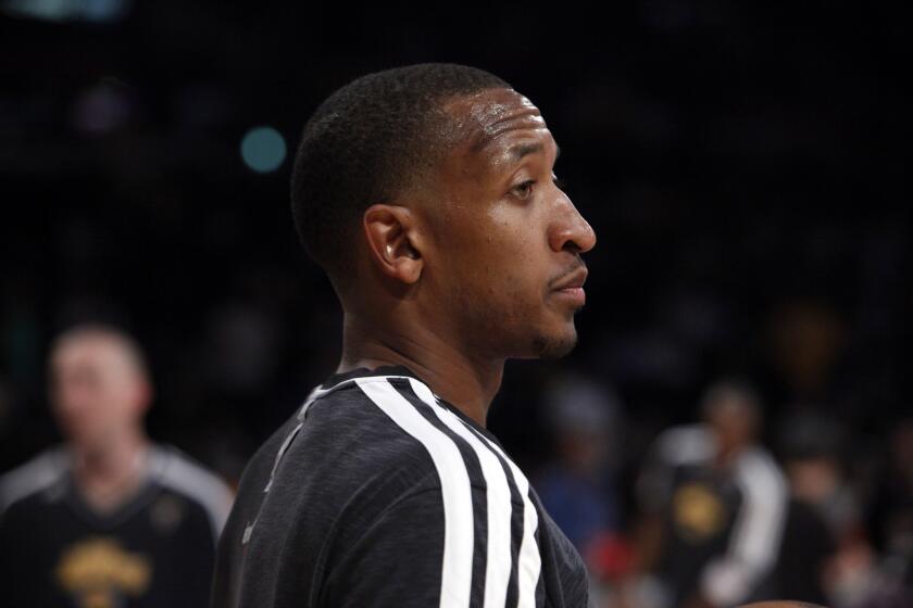 Chris Duhon, shown warming up with the Lakers last season, ended up in the hospital after an incident in an Orlando parking garage over the weekend.