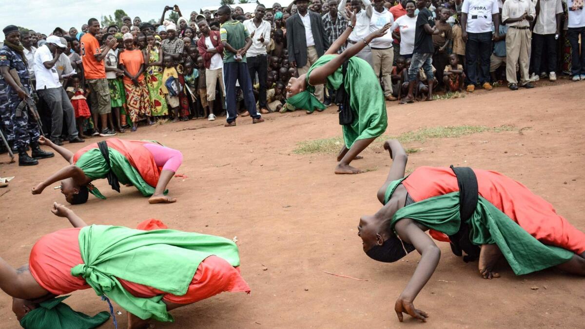 Dancers perform at a rally in Bujumbura, Burundi, to protest the referendum that could extend President Pierre Nkurunziza's term.
