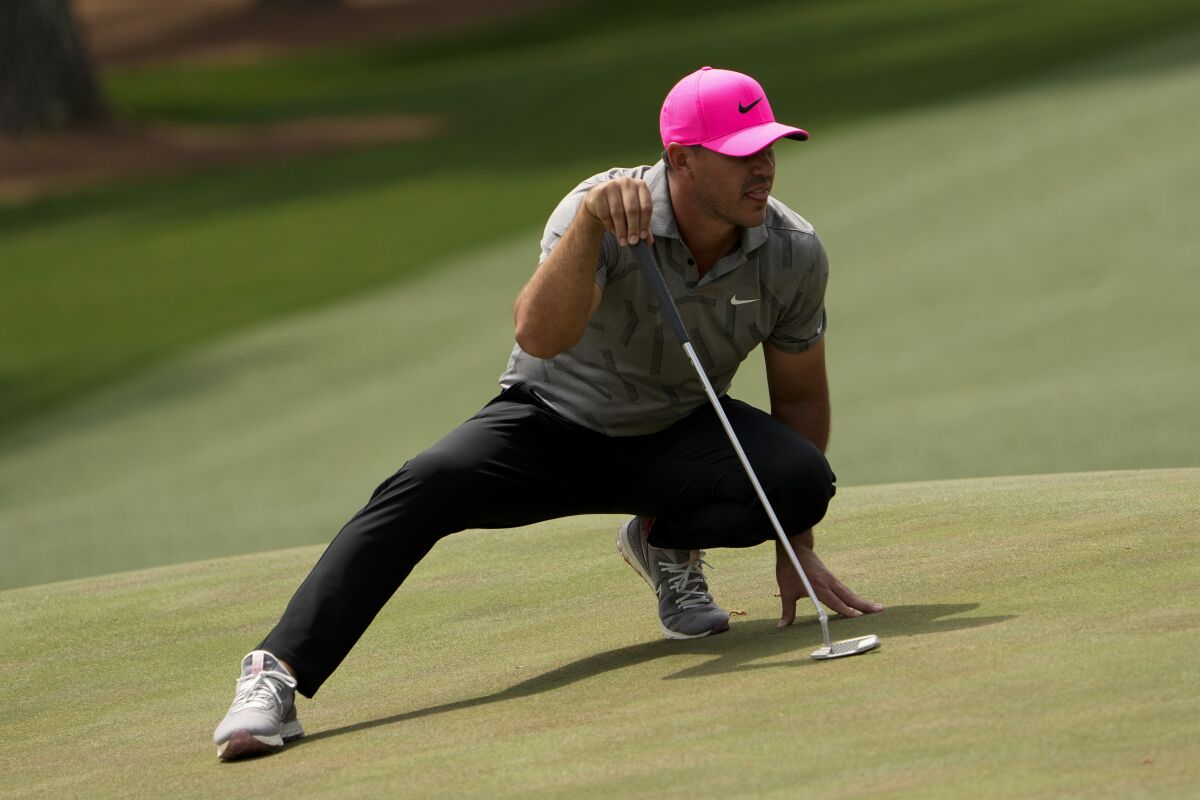 Brooks Koepka had to take some weird positions to protect his ailing right knee in 2021.