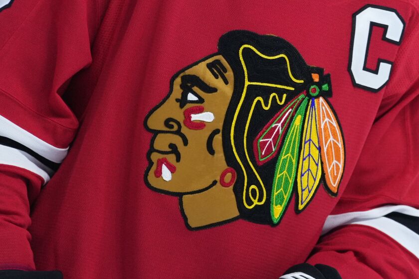 FILE - The Chicago Blackhawks' logo is seen during an NHL hockey game on Jan. 19, 2023, in Philadelphia. The Blackhawks will not wear Pride-themed warmup jerseys before Sunday's March 26, 2023, Pride Night game against Vancouver because of security concerns involving a Russian law that expands restrictions on activities seen as promoting LGBTQ rights in the country. (AP Photo/Matt Slocum, File)