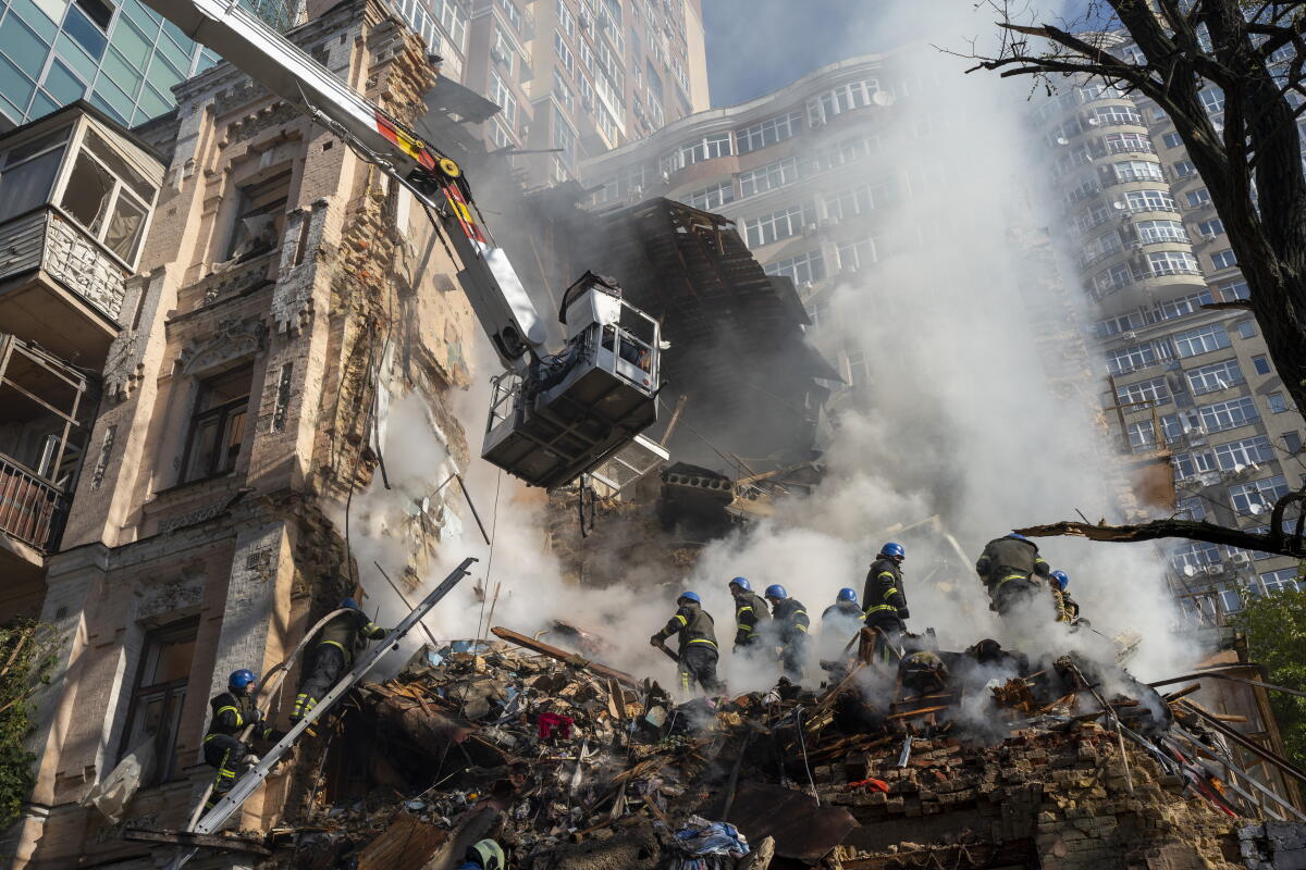 Ukraine Firemen Russian-sent drones in Ukraine cause deaths, diplomatic storms - Los ...