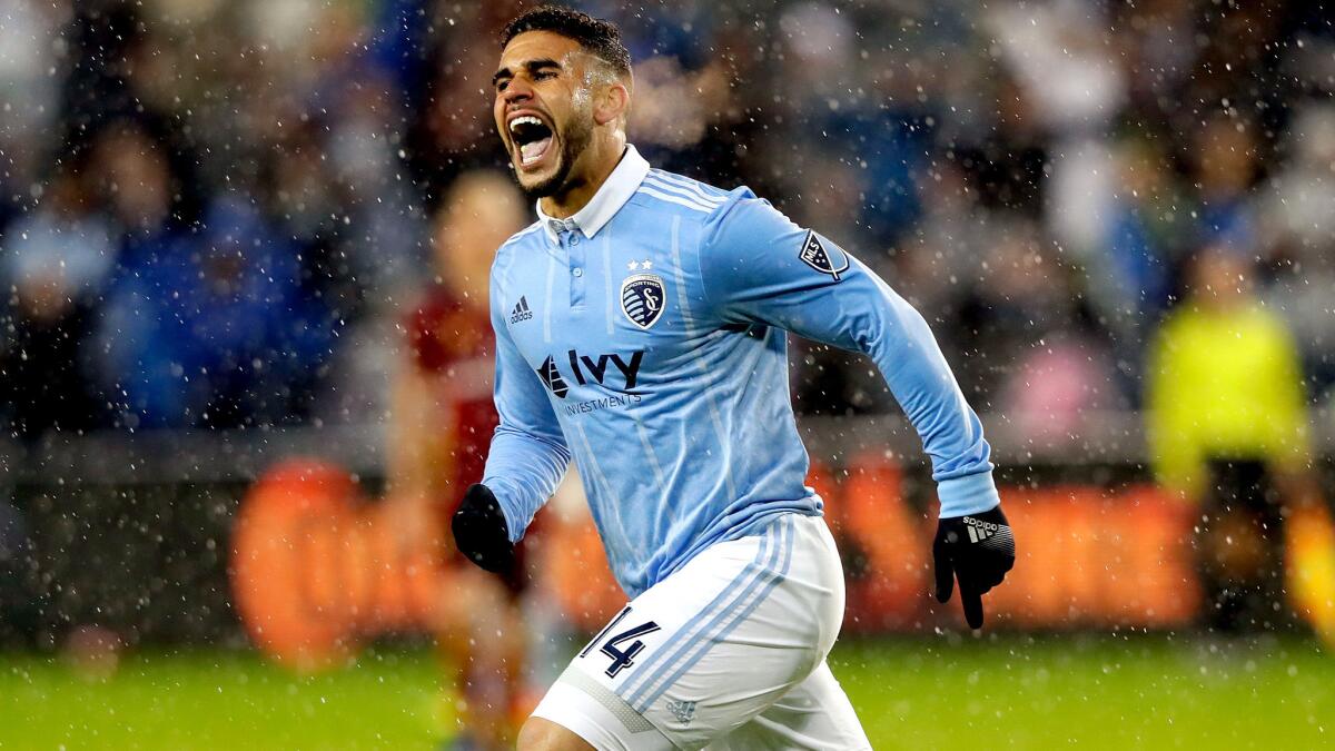 Dom Dwyer celebrates after scoring a goal for Sporting Kansas City during an MLS game in April.