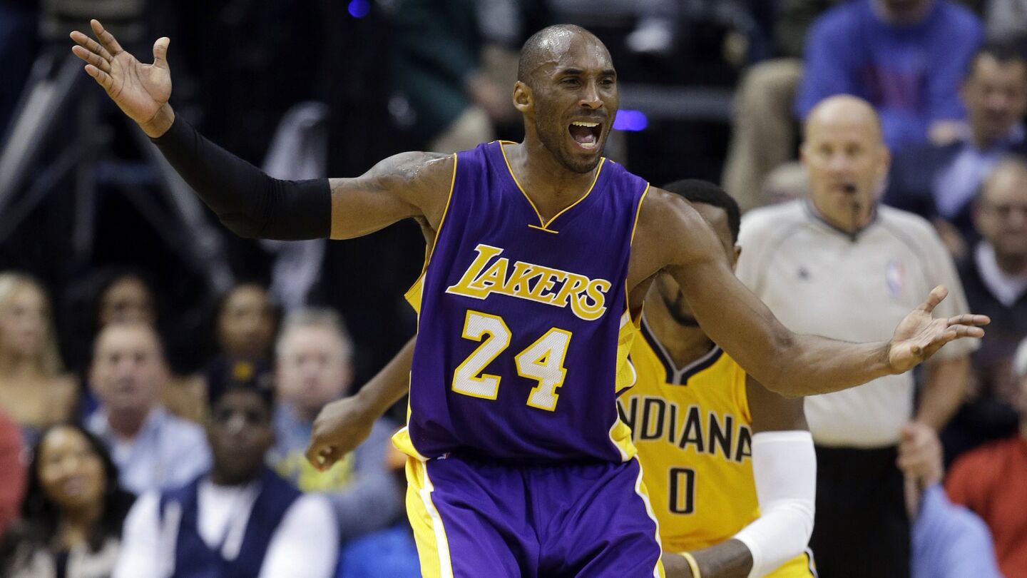 Lakers star Kobe Bryant gestures while looking for a referee to make a foul call during the second half of a 110-91 loss to the Indiana Pacers on Monday.