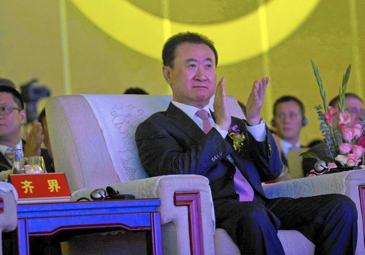 Chinese billionaire Wang Jianlin, who owns China's biggest cinema chain, is looking to buy Lionsgate, the independent studio behind the lucrative "Hunger Games" and "Twilight" franchises.