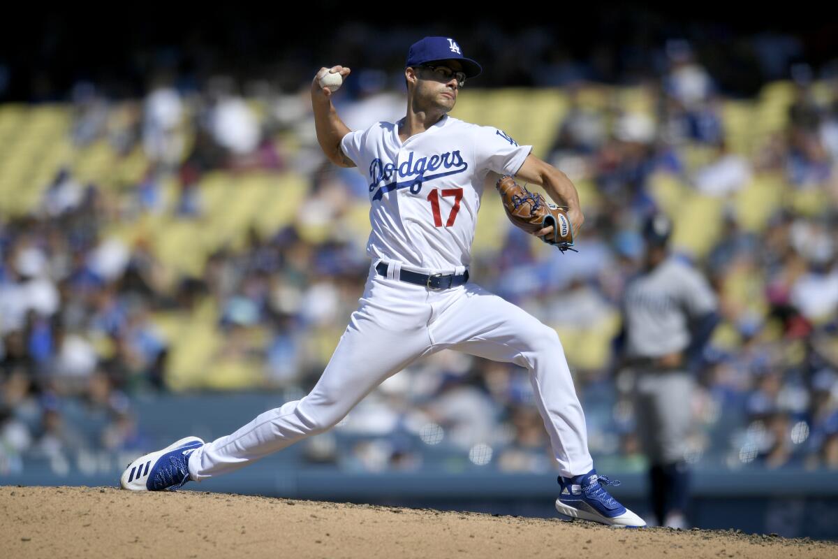 Dodgers reliever Joe Kelly delivers against the San Diego Padres on Aug. 4.