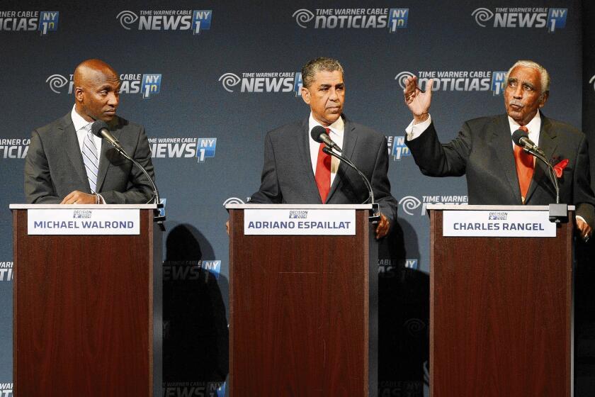 Rep. Charles Rangel, right, gestures during a debate with state Sen. Adriano Espaillat, center, and the Rev. Michael Waldrond Jr. Polls show Rangel leading Espaillat by several points and both far ahead of Walrond.