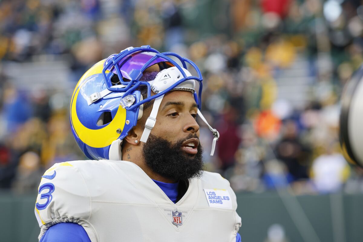 Odell Beckham Jr. (3) walks on Lambeau Field before the Rams' game against the Green Bay Packers.
