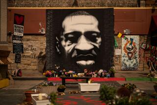 MINNEAPOLIS, MN - MAY 22: A mural depicting the late George Floyd at George Floyd Memorial Square, on Saturday, May 22, 2021 in Minneapolis, MN. (Kent Nishimura / Los Angeles Times)
