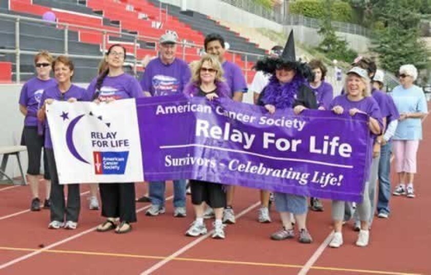 After the survivor lap, participants start the 24 hours of walking at the 2012 Relay.