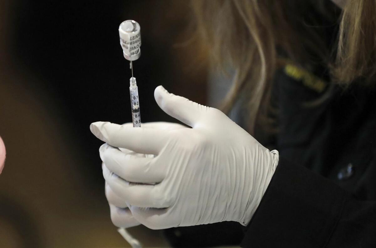 A Pfizer vaccine shot is shown at the Oasis Senior Center vaccine clinic hosted by the city of Newport Beach on Tuesday.