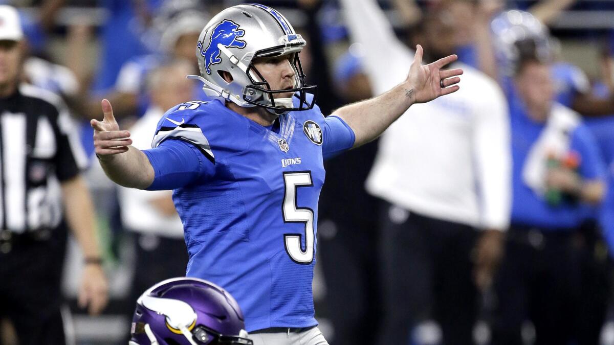 Lions kicker Matt Prater watches his game-winning field goal on the final play of the game against the Vikings on Thursday in Detroit.