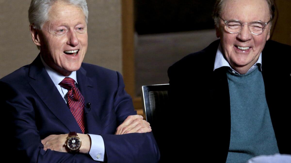 Former President Bill Clinton, left, and author James Patterson speak during an interview in May about their new novel, "The President Is Missing," in New York.