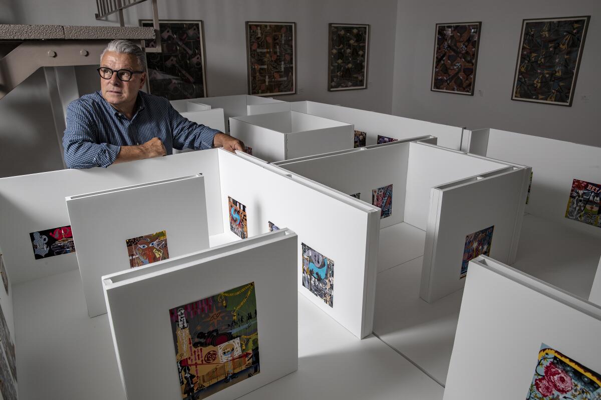 Lari Pittman with the scale model replicating the layout of his upcoming Hammer Museum retrospective.