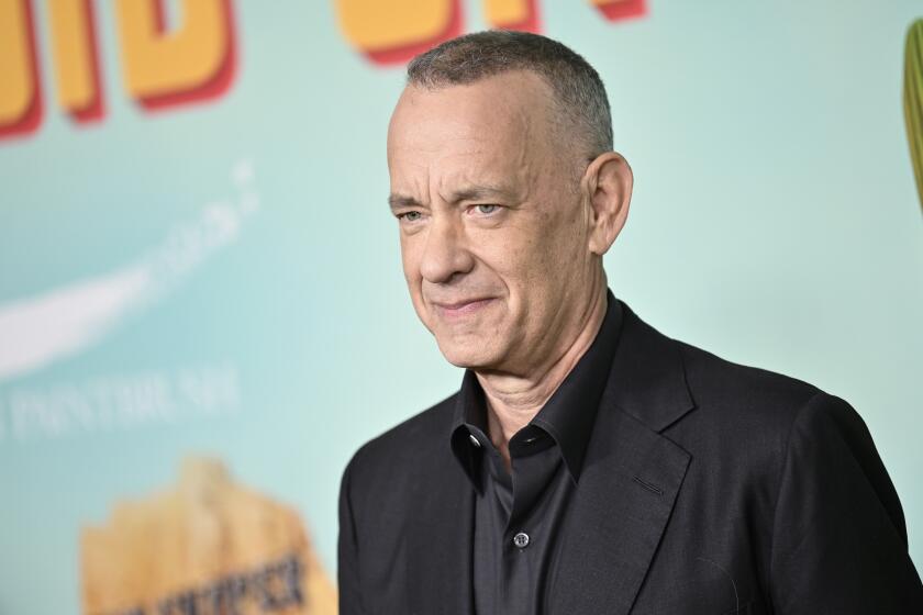 Tom Hanks in black suit at the premiere of "Asteroid City" at Alice Tully Hall on Tuesday, June 13, 2023, in New York