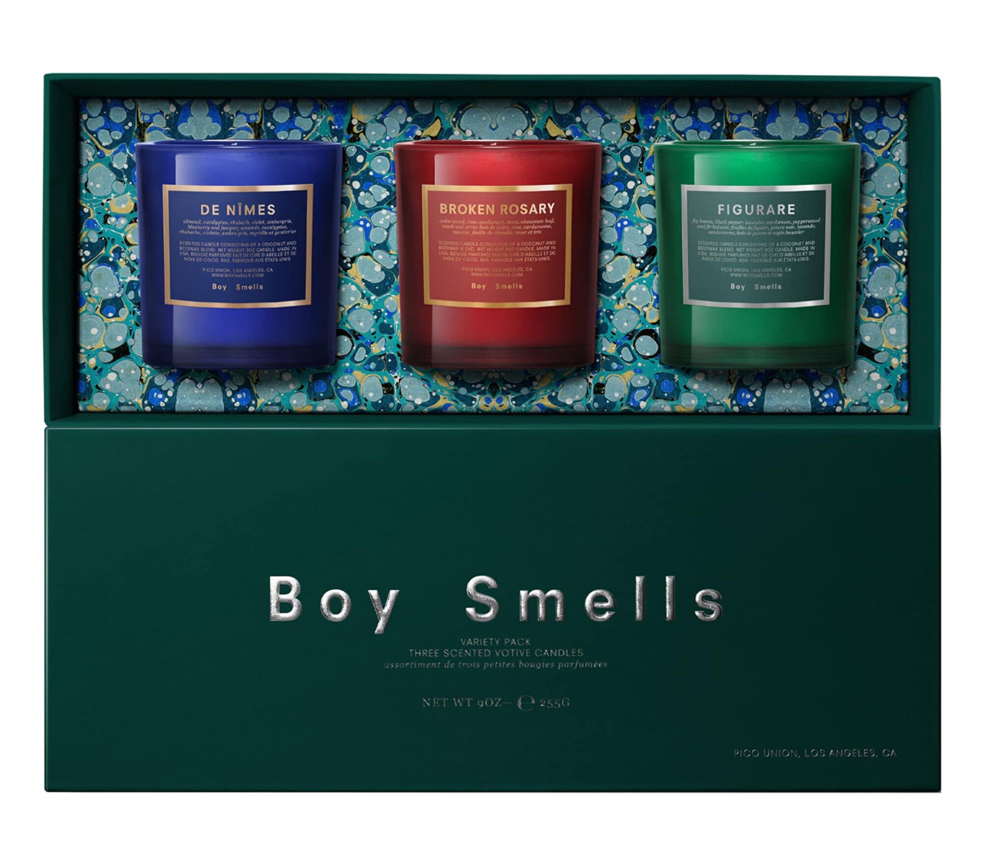 A package of three Boy Smells scented votive candles