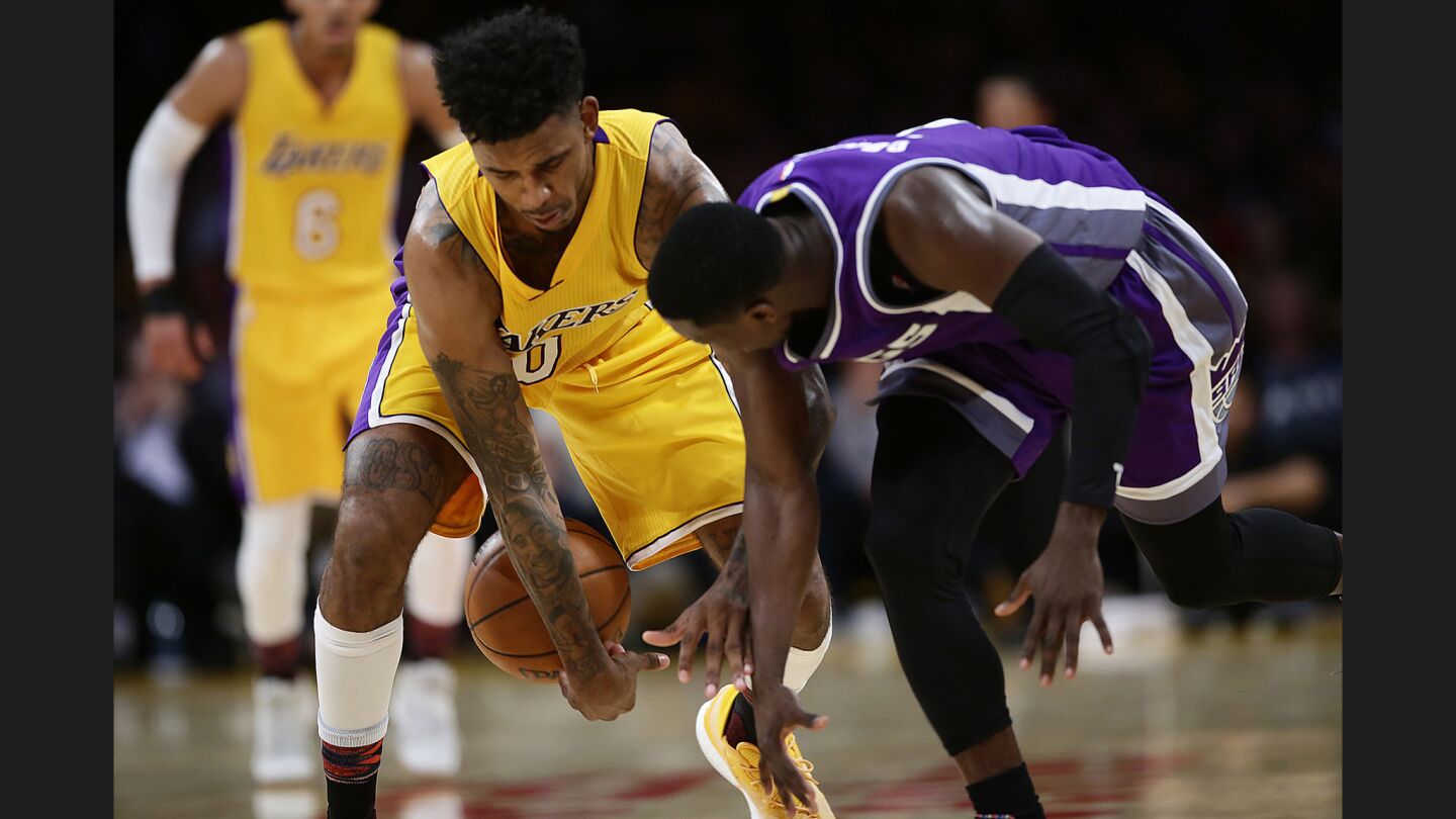 Lakers guard Nick Young steals the ball from Kings guard Darren Collison during the second half of a game on Feb. 14 at Staples Center.