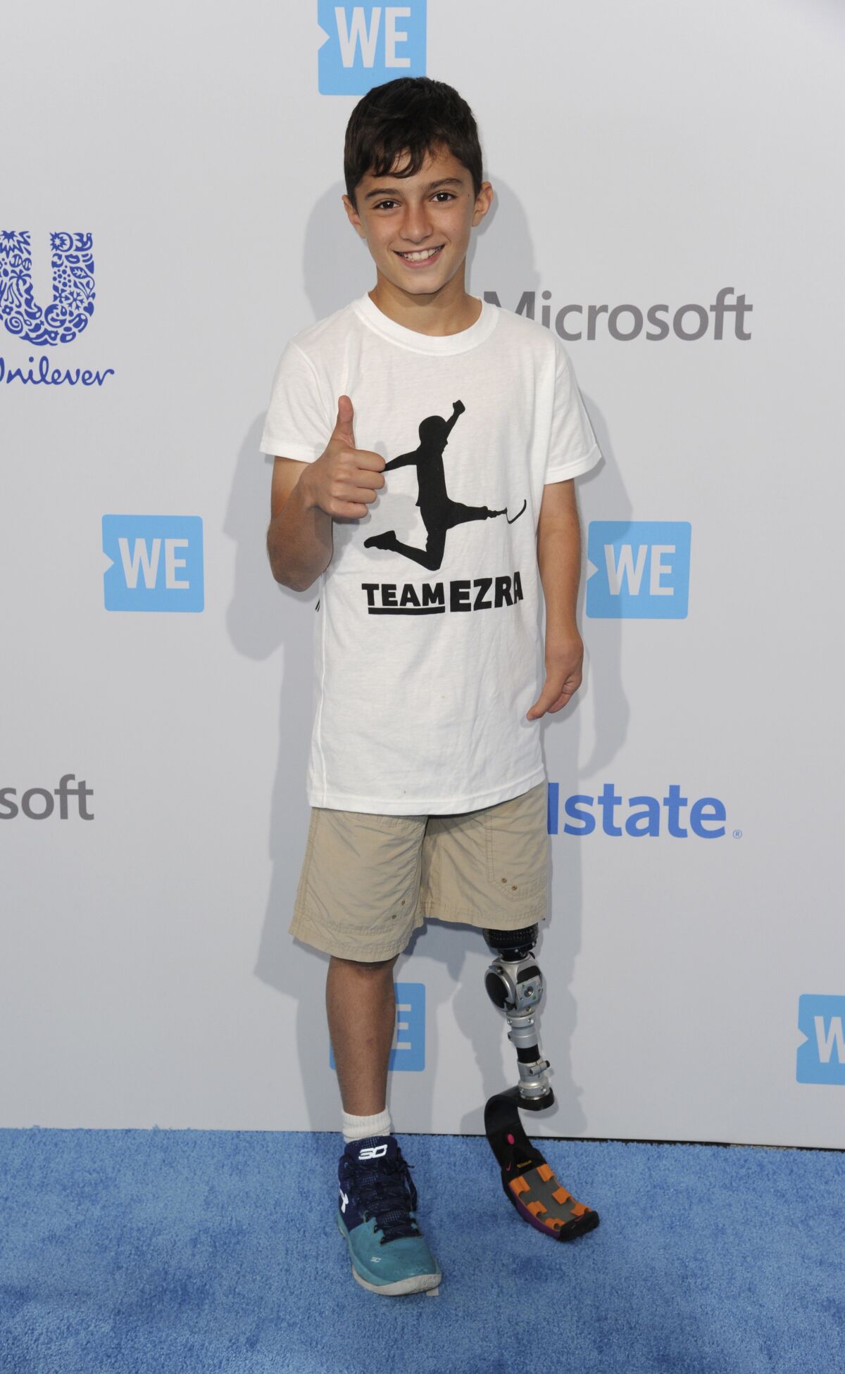 Ezra Frech arrives at WE Day California at the Forum.