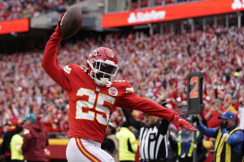 Kansas City Chiefs running back Clyde Edwards-Helaire celebrates after scoring during the first half of an NFL football game against the Pittsburgh Steelers Sunday, Dec. 26, 2021, in Kansas City, Mo. (AP Photo/Ed Zurga)