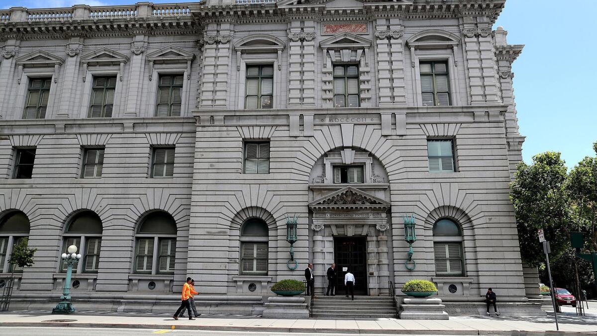 The federal courthouses in California will continue to operate during the partial government shutdown "as long as they are able," an official said. Above, the 9th Circuit Court of Appeals in San Francisco.