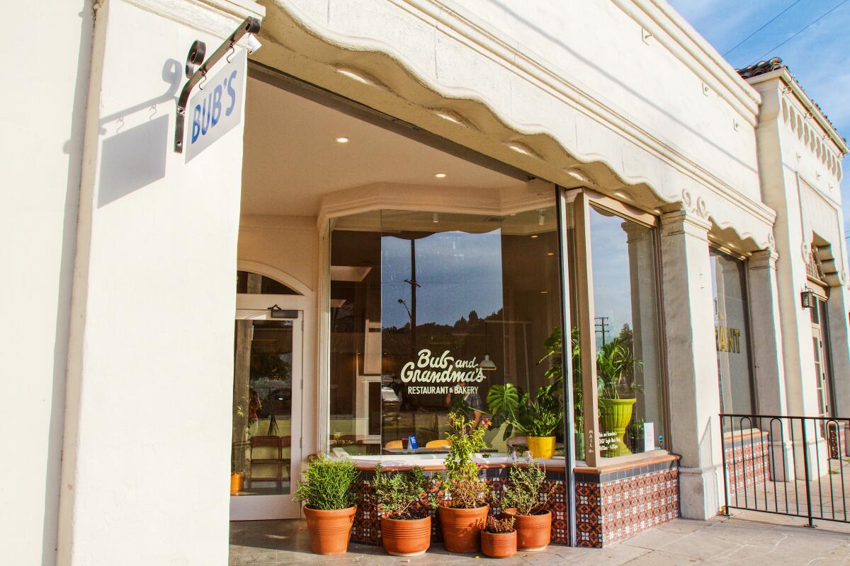 An exterior photo of the new Bub and Grandma's restaurant. A small hanging sign reads: "BUB'S."