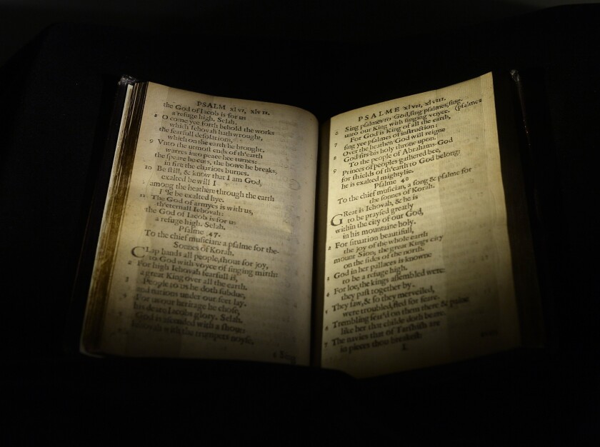 The translation of the biblical psalms, the Bay Psalm Book, is seen at Sotheby's in New York. The book was printed by Puritan settlers in Cambridge, Mass., in 1640.